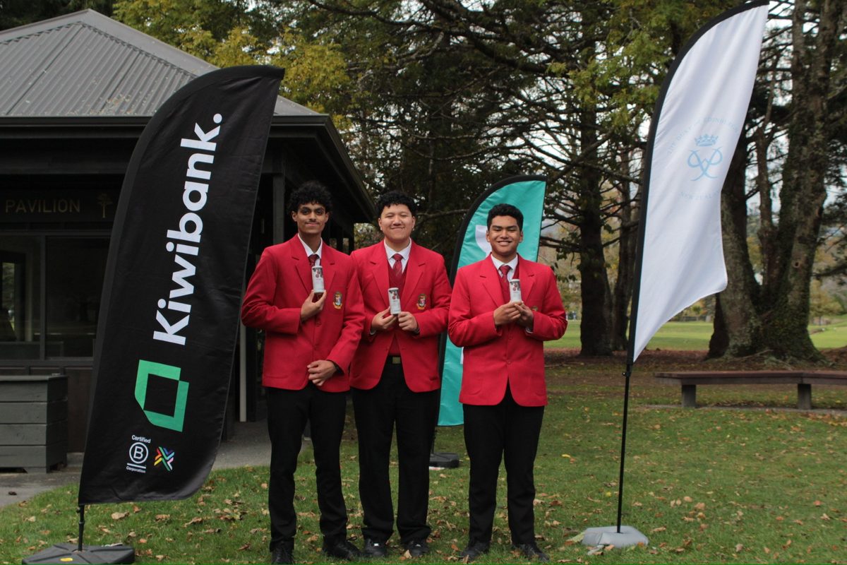 Players with Kiwibank flags at Royal Wellington