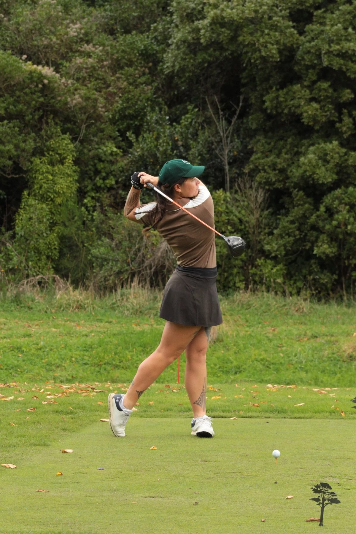 A player teeing off